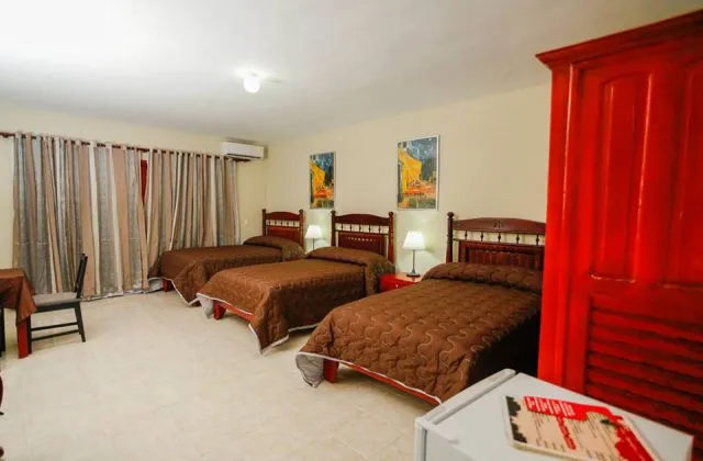 Hotel Cortecito Inn Punta Cana habitacion 3 camas